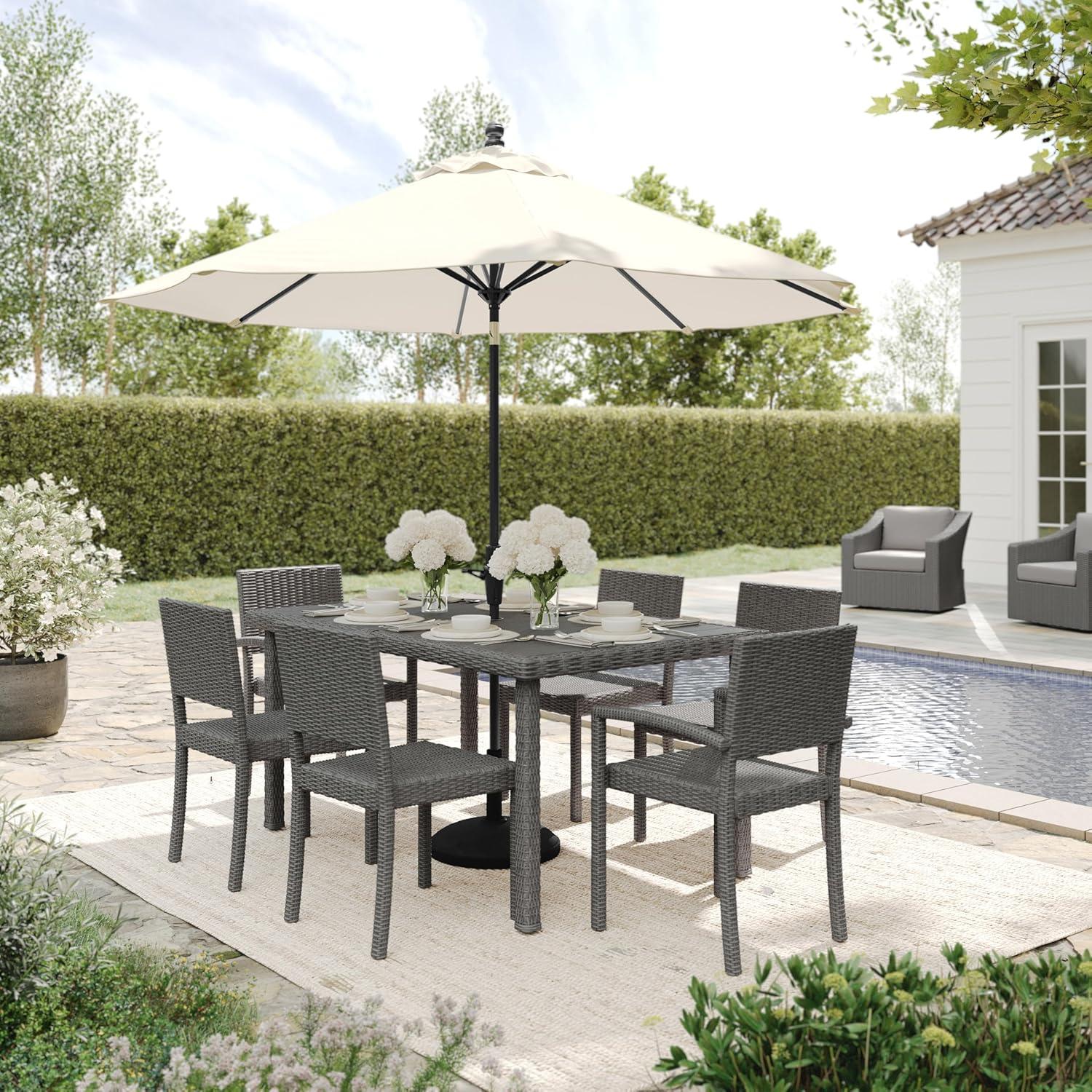 imageMartha Stewart Bedford 7Piece IndoorOutdoor Dining Set with 6 Stackable Chairs and 62 Patio Table with Faux Wood Top and Rattan Wicker Finish in GrayGrey