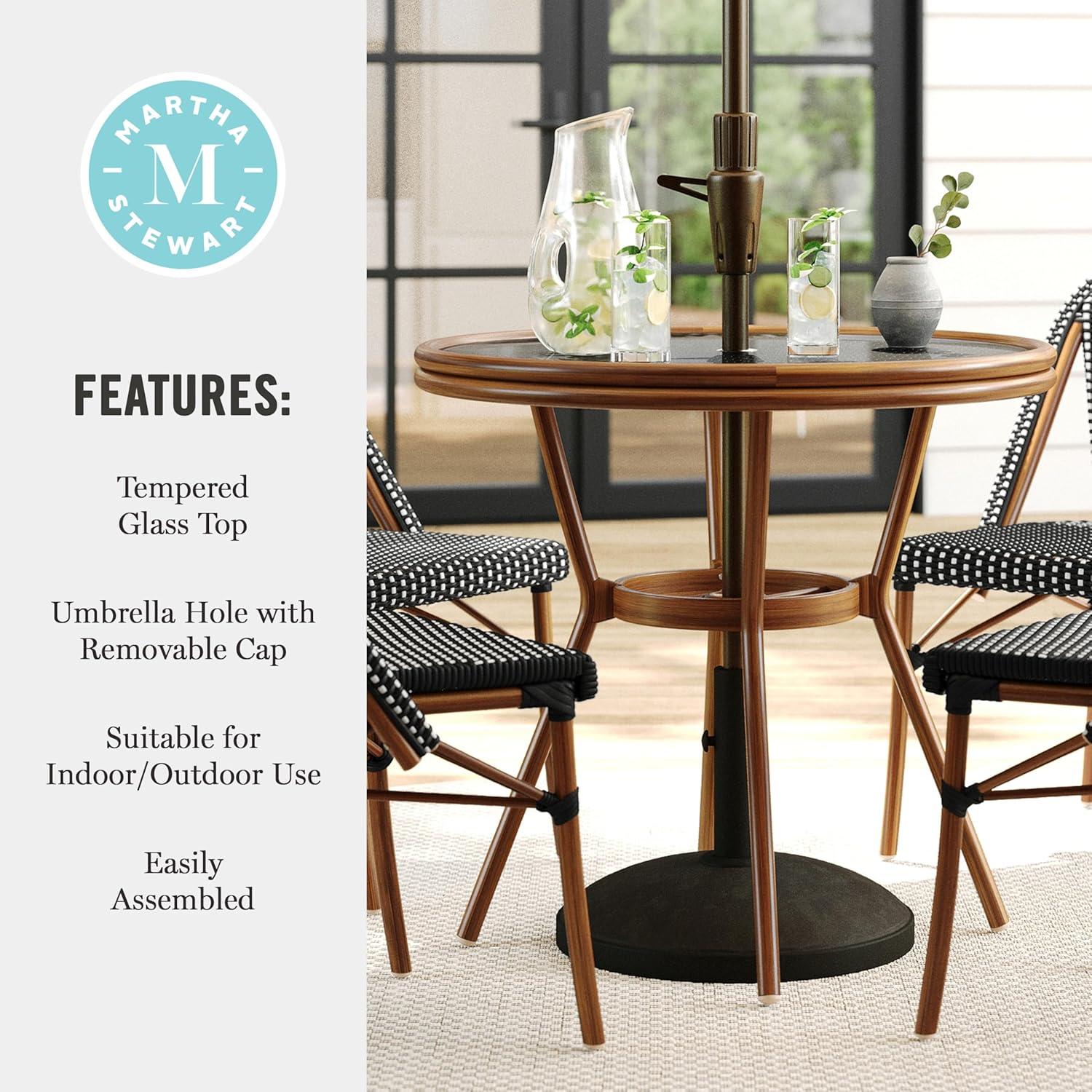 imageMartha Stewart Lily Pond 31 Round IndoorOutdoor Bistro Dining Table with Aluminum Frame in Gray Woodgrain and Rattan Top in WhiteGray with Tempered Glass TopBlack WhiteNatural Frame