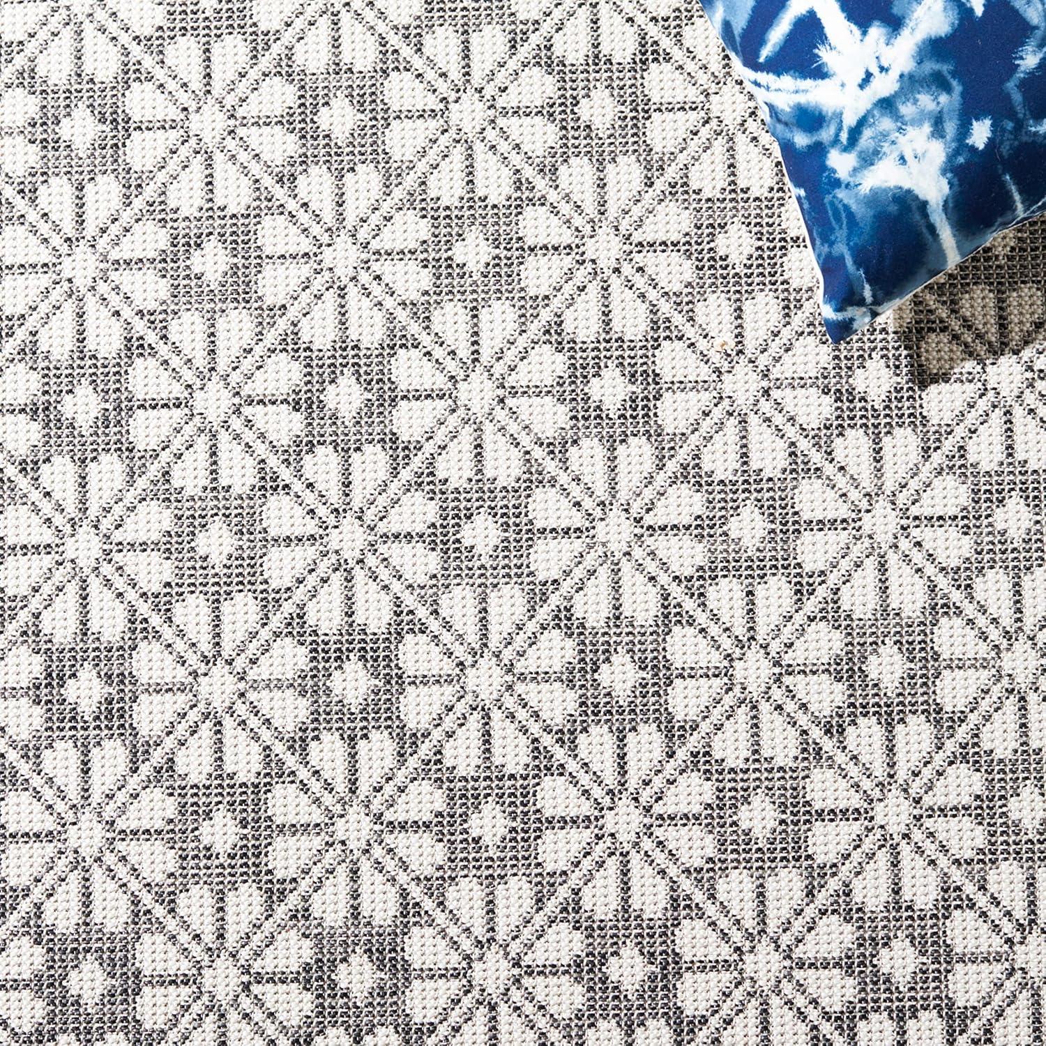 imageMartha Stewart x SAFAVIEH Outdoor Area Rug Collection 8 x 10 Black Weather Resistant amp Washable Ideal for Patio Backyard Mudroom Deck Dining Space MSR4491Z