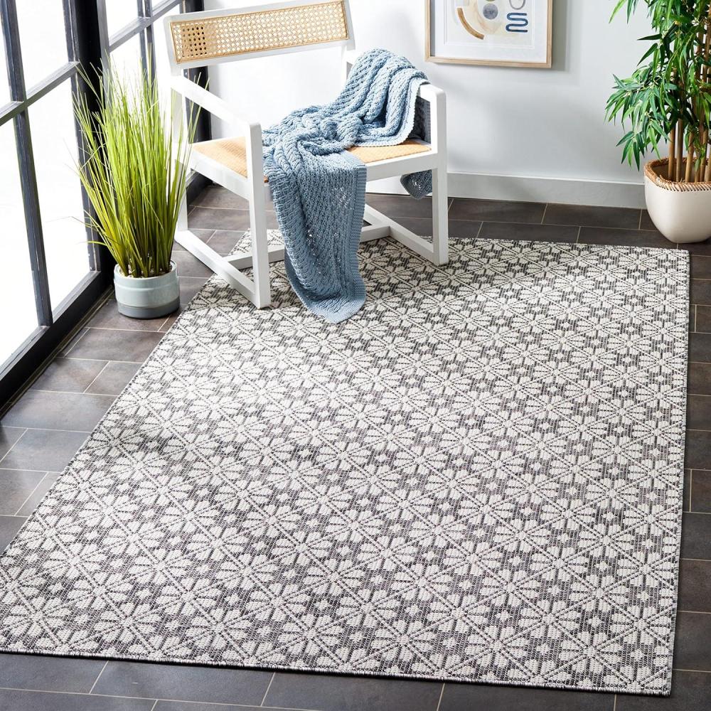 imageMartha Stewart x SAFAVIEH Outdoor Area Rug Collection 8 x 10 Black Weather Resistant amp Washable Ideal for Patio Backyard Mudroom Deck Dining Space MSR4491Z