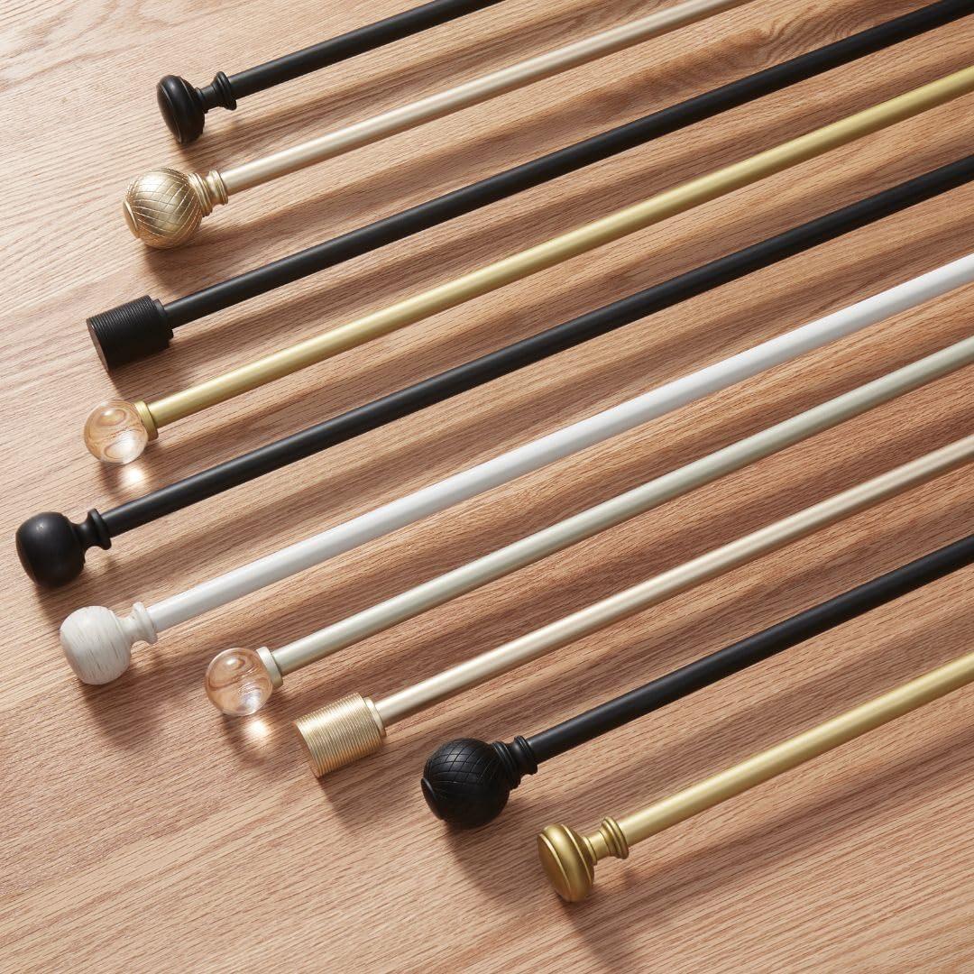 imageMartha Stewart Beaufort Curtain Rod for Windows 66 to 120 inches Adjustable Length 75 inch Diameter Metal Curtain Rod with Round Finials 66 120 Brushed BrassBlack