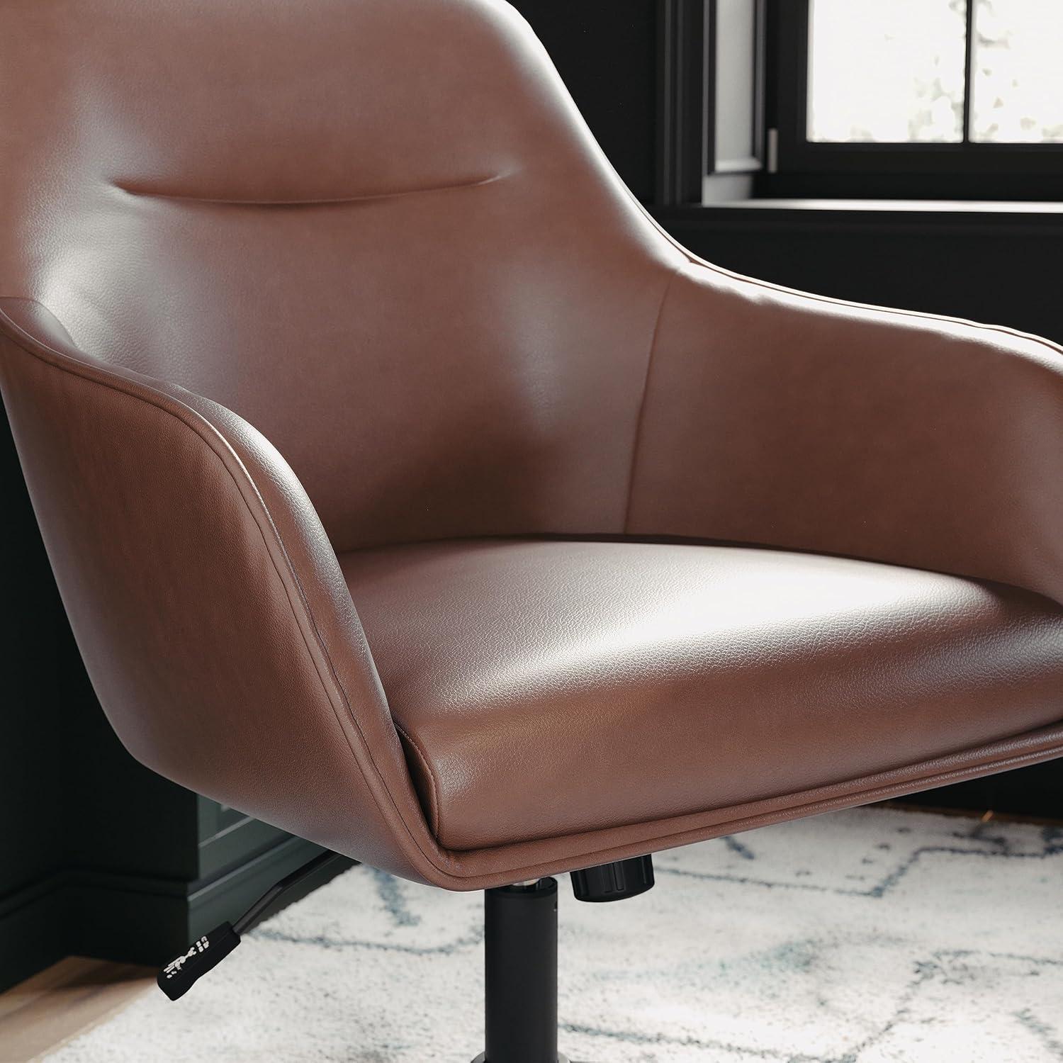 imageMartha Stewart Rayna Swivel Task Chair with Flared Arms for Home Office in Off White Fabric with Polished Brass FrameSaddle Brown Faux LeatherOil Rubbed Bronze