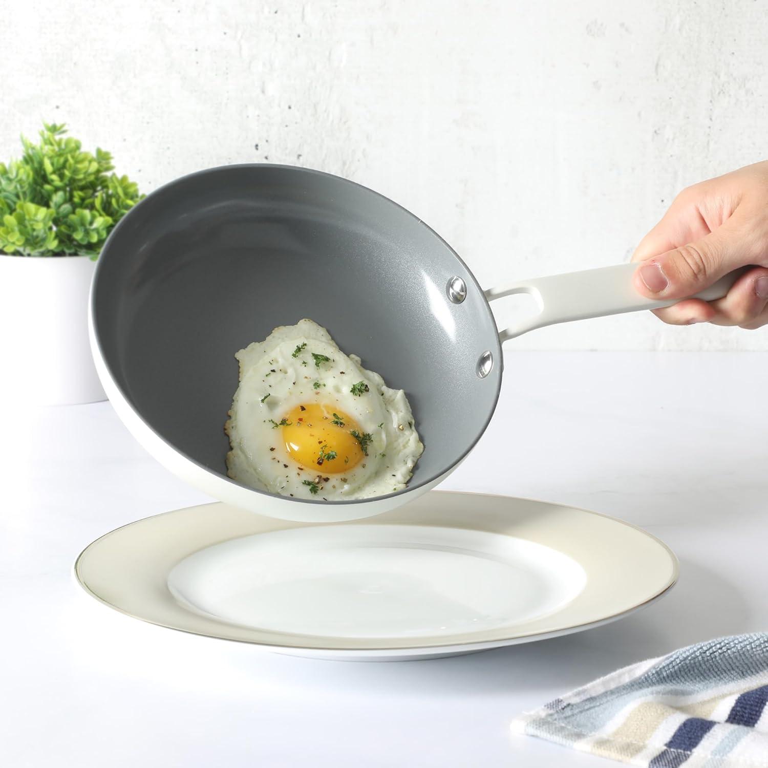 imageMartha Stewart Emmeline Premium Nonstick PFA Free Ceramic Interior 12 Piece Heavy Gauge Enamel Aluminum Pots and Pans Cookware Set TealLinen White