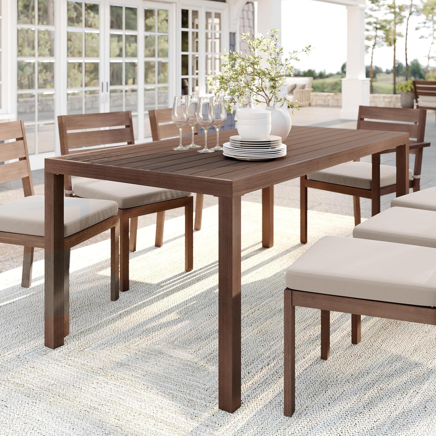 imageMartha Stewart Bedford 62 IndoorOutdoor Aluminum Patio Table with Umbrella Hole and Brushed Woodgrain Finish in BrownBrown