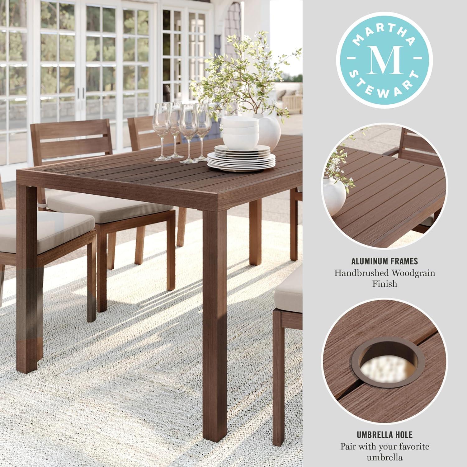 imageMartha Stewart Bedford 62 IndoorOutdoor Aluminum Patio Table with Umbrella Hole and Brushed Woodgrain Finish in BrownBrown