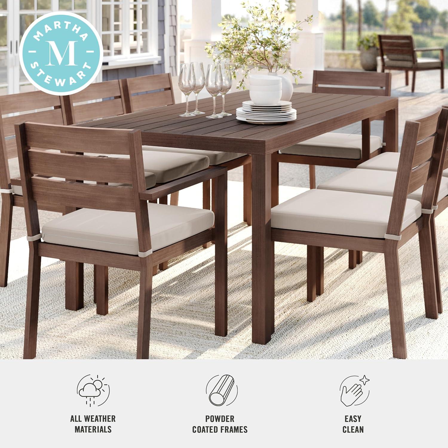 imageMartha Stewart Bedford 62 IndoorOutdoor Aluminum Patio Table with Umbrella Hole and Brushed Woodgrain Finish in BrownBrown