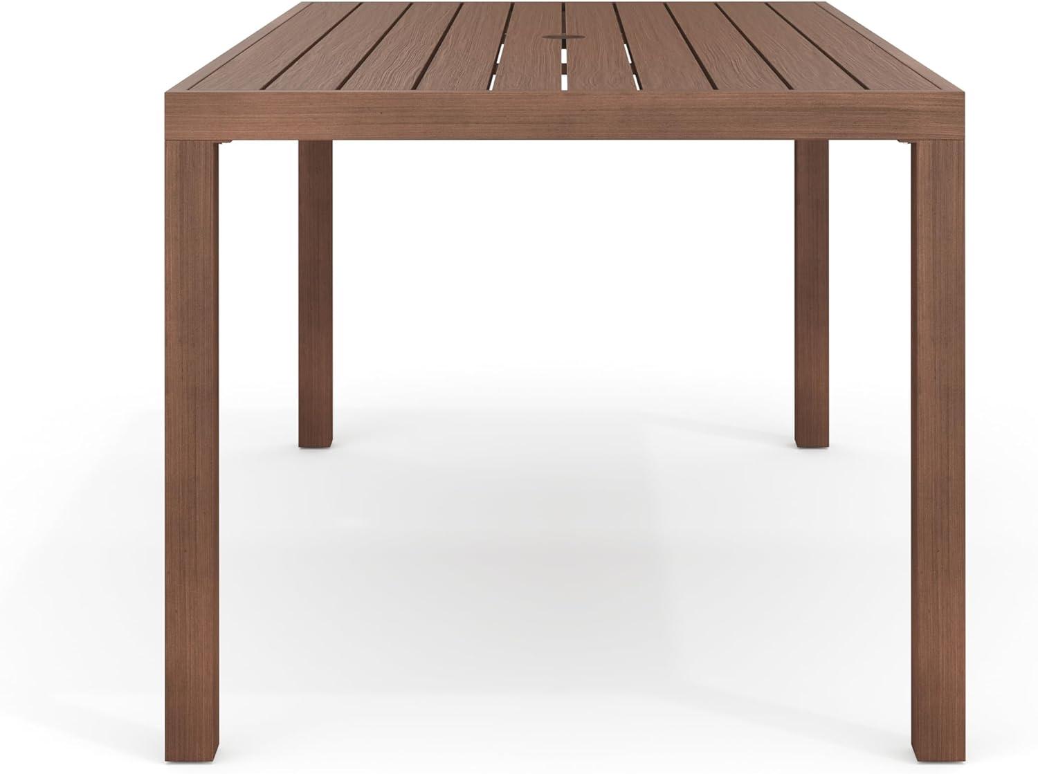 imageMartha Stewart Bedford 62 IndoorOutdoor Aluminum Patio Table with Umbrella Hole and Brushed Woodgrain Finish in BrownBrown