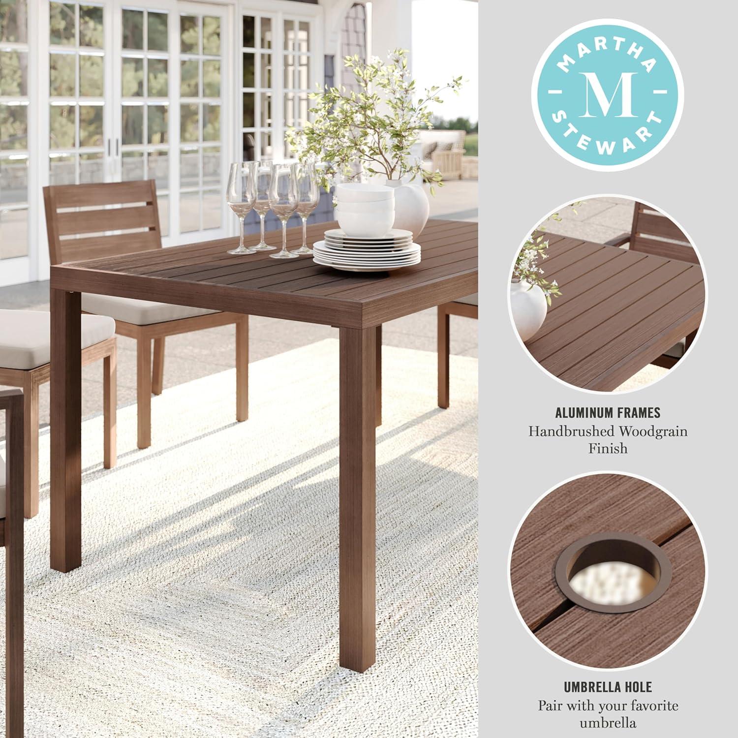 imageMartha Stewart Bedford 62 IndoorOutdoor Aluminum Patio Table with Umbrella Hole and Brushed Woodgrain Finish in BrownBrown