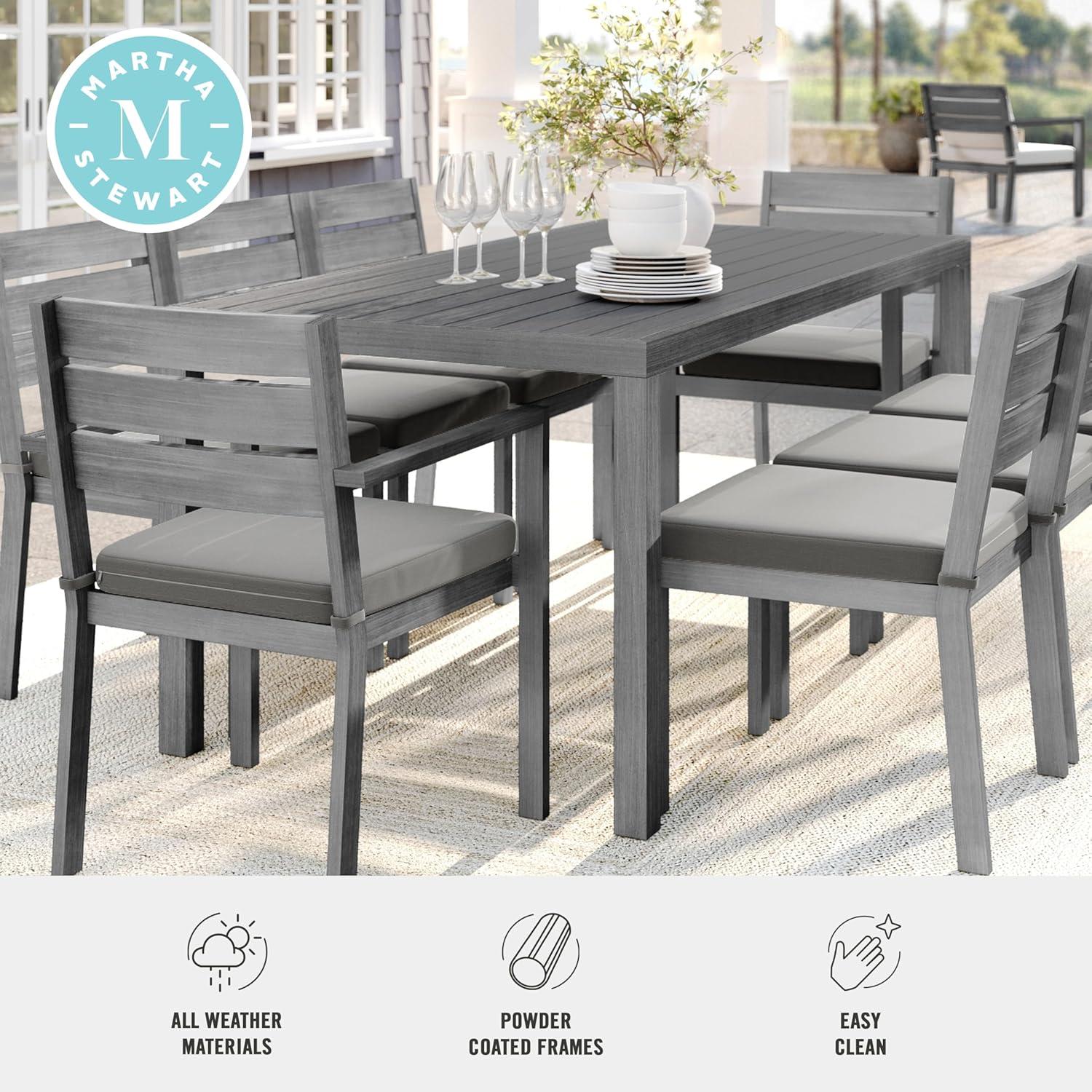 imageMartha Stewart Bedford 62 IndoorOutdoor Aluminum Patio Table with Umbrella Hole and Brushed Woodgrain Finish in BrownGrey