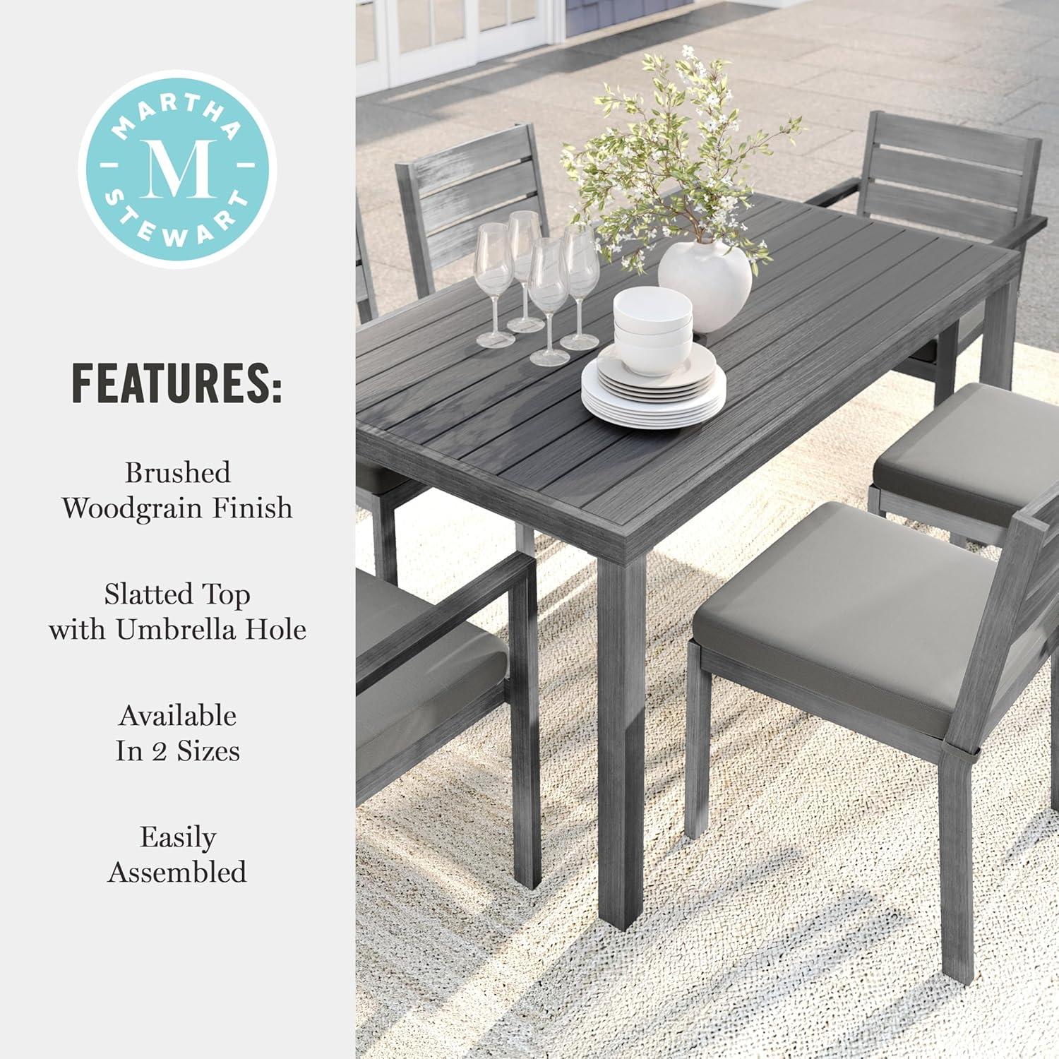 imageMartha Stewart Bedford 62 IndoorOutdoor Aluminum Patio Table with Umbrella Hole and Brushed Woodgrain Finish in BrownGrey