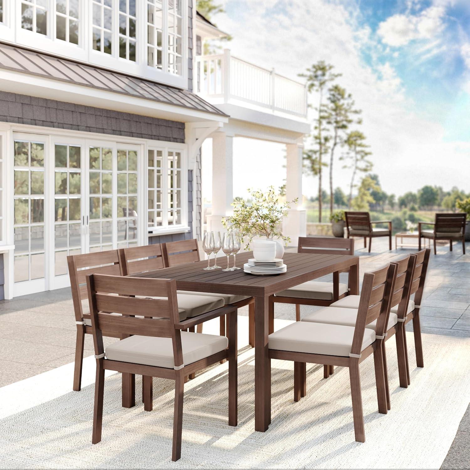 imageMartha Stewart Bedford IndoorOutdoor Stackable Aluminum Patio Armchair with Brushed Woodgrain Finish in Brown and Cream AllWeather CushionBrown