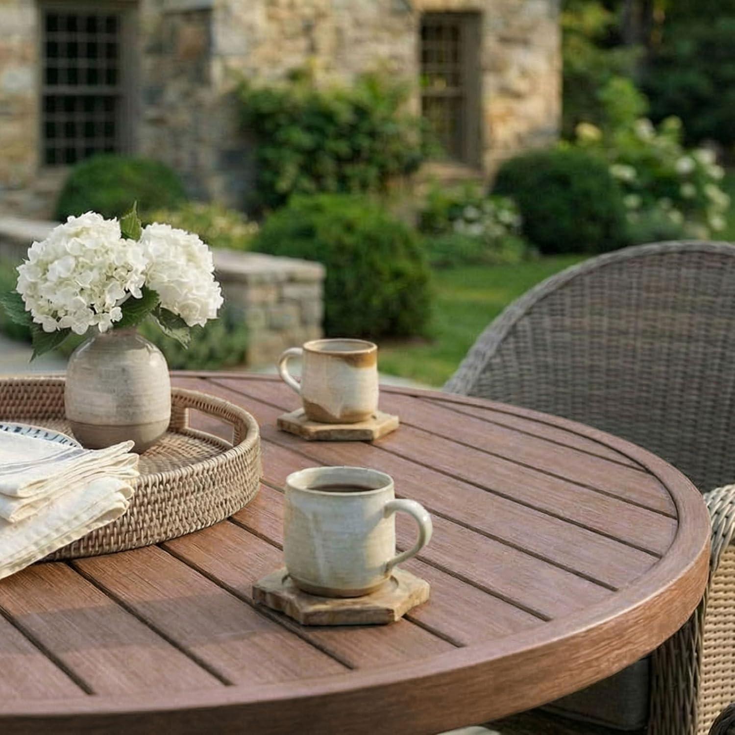 imageMartha Stewart Bedford 36 Round IndoorOutdoor Aluminum Patio Dining Table with Trestle Base Accommodates up to 4 Adults Brushed Brown Woodgrain FinishBrown