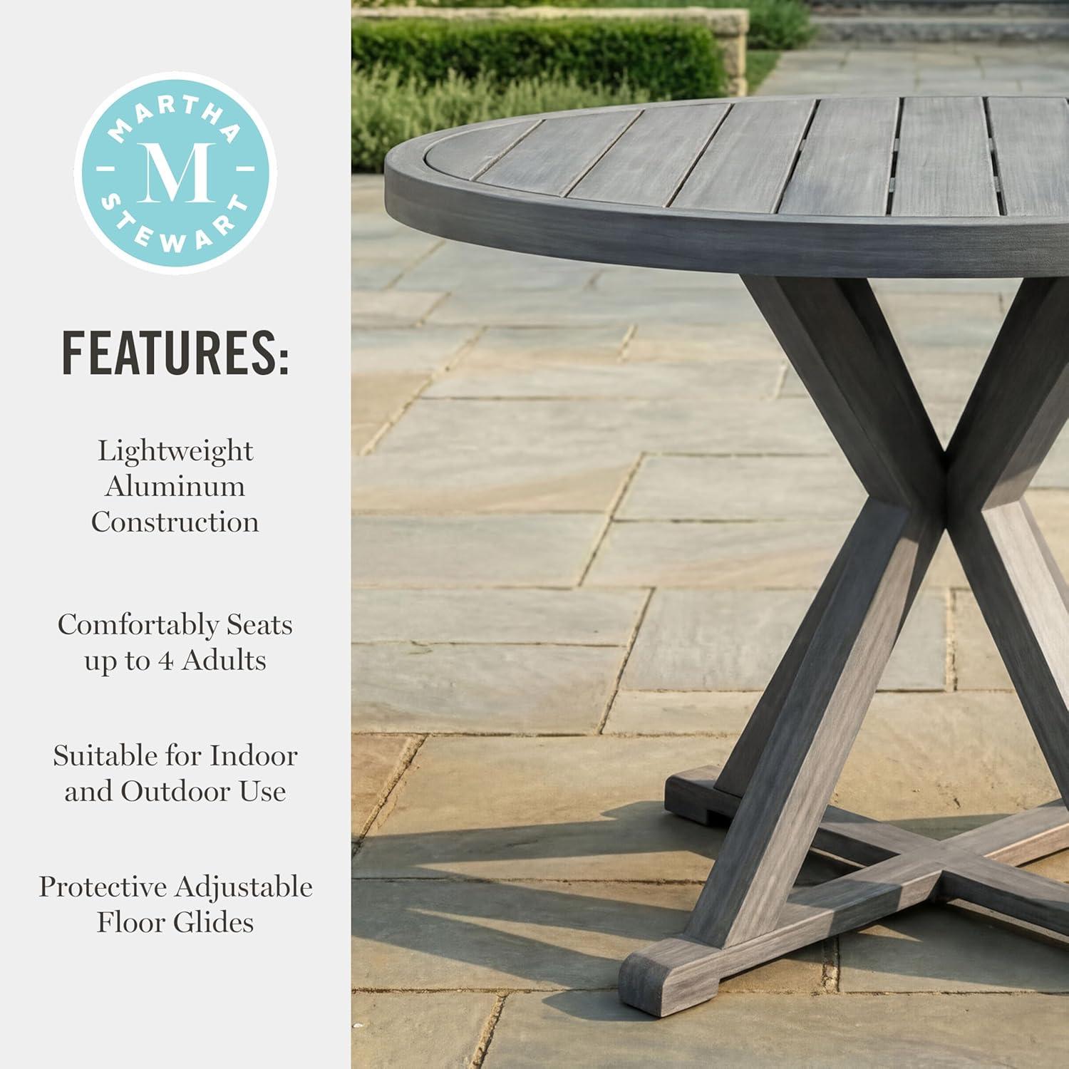 imageMartha Stewart Bedford 36 Round IndoorOutdoor Aluminum Patio Dining Table with Trestle Base Accommodates up to 4 Adults Brushed Brown Woodgrain FinishGrey