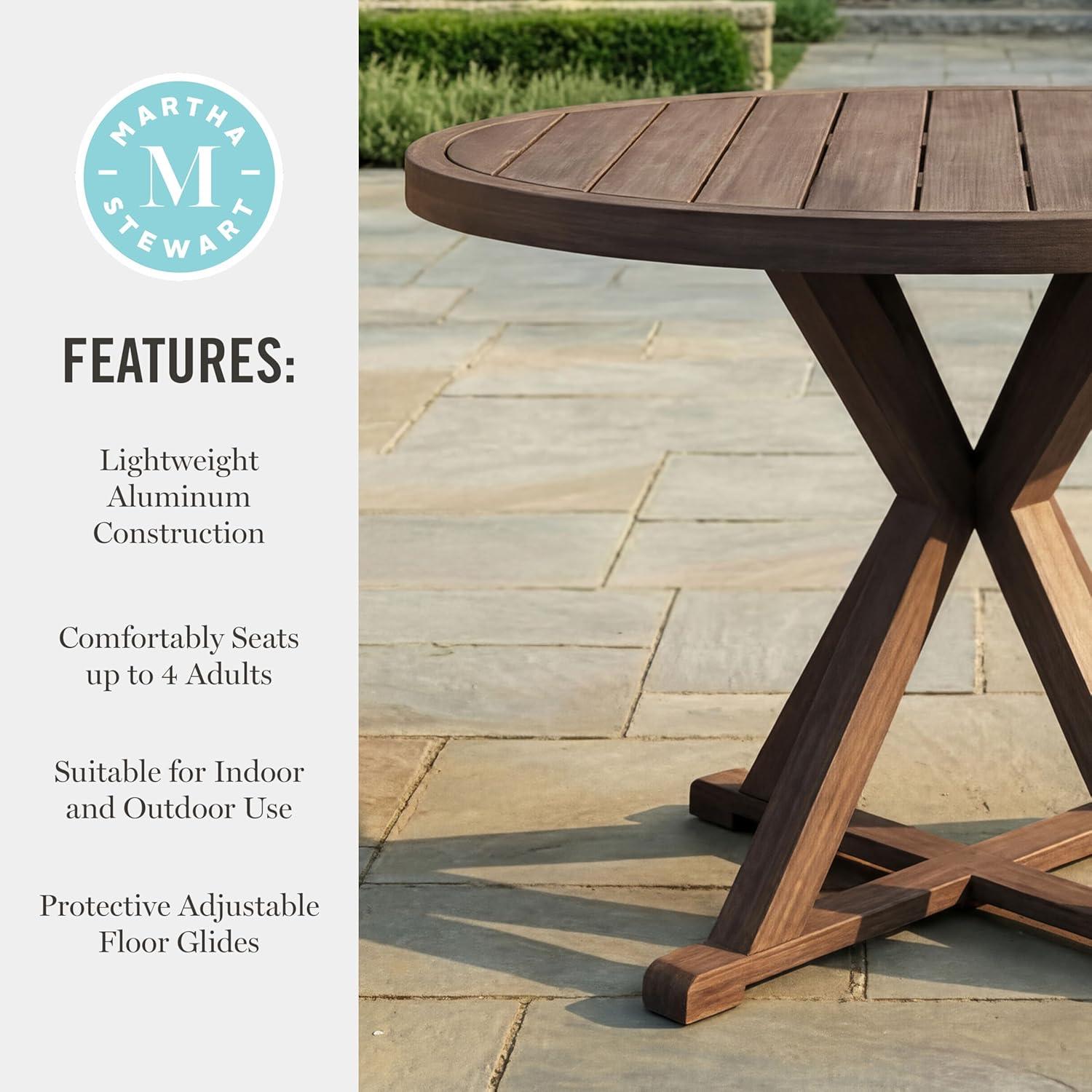 imageMartha Stewart Bedford 36 Round IndoorOutdoor Aluminum Patio Dining Table with Trestle Base Accommodates up to 4 Adults Brushed Brown Woodgrain FinishBrown