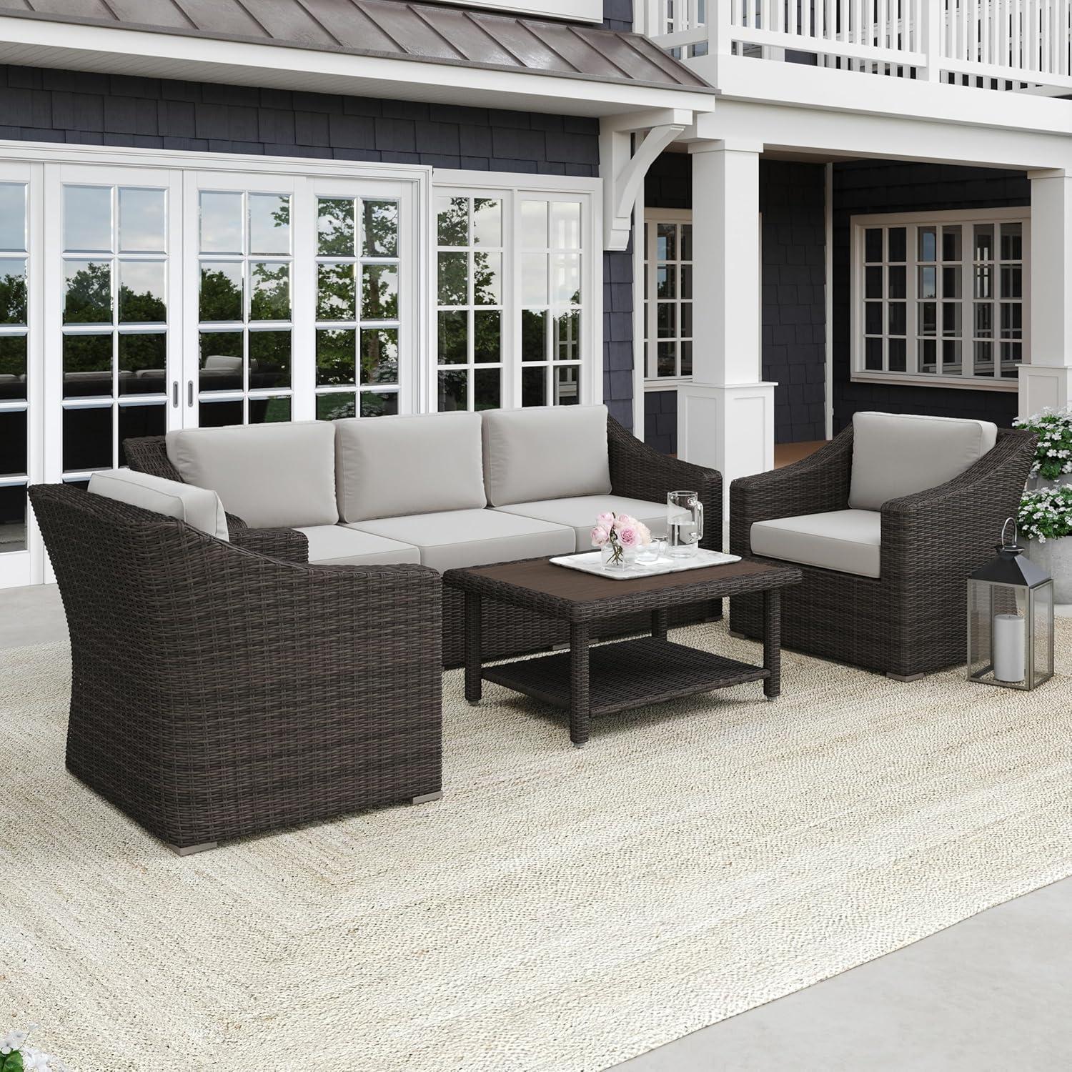 imageMartha Stewart Bedford 4Piece IndoorOutdoor Conversation Set with Sofa 2 Accent Chairs and Coffee Table in Gray Rattan Wicker with Gray AllWeather CushionsTan CushionsBrown Frame