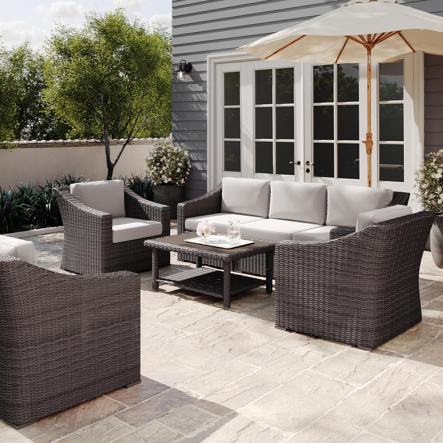 imageMartha Stewart Bedford 4Piece IndoorOutdoor Conversation Set with Sofa 2 Accent Chairs and Coffee Table in Gray Rattan Wicker with Gray AllWeather CushionsTan CushionsBrown Frame