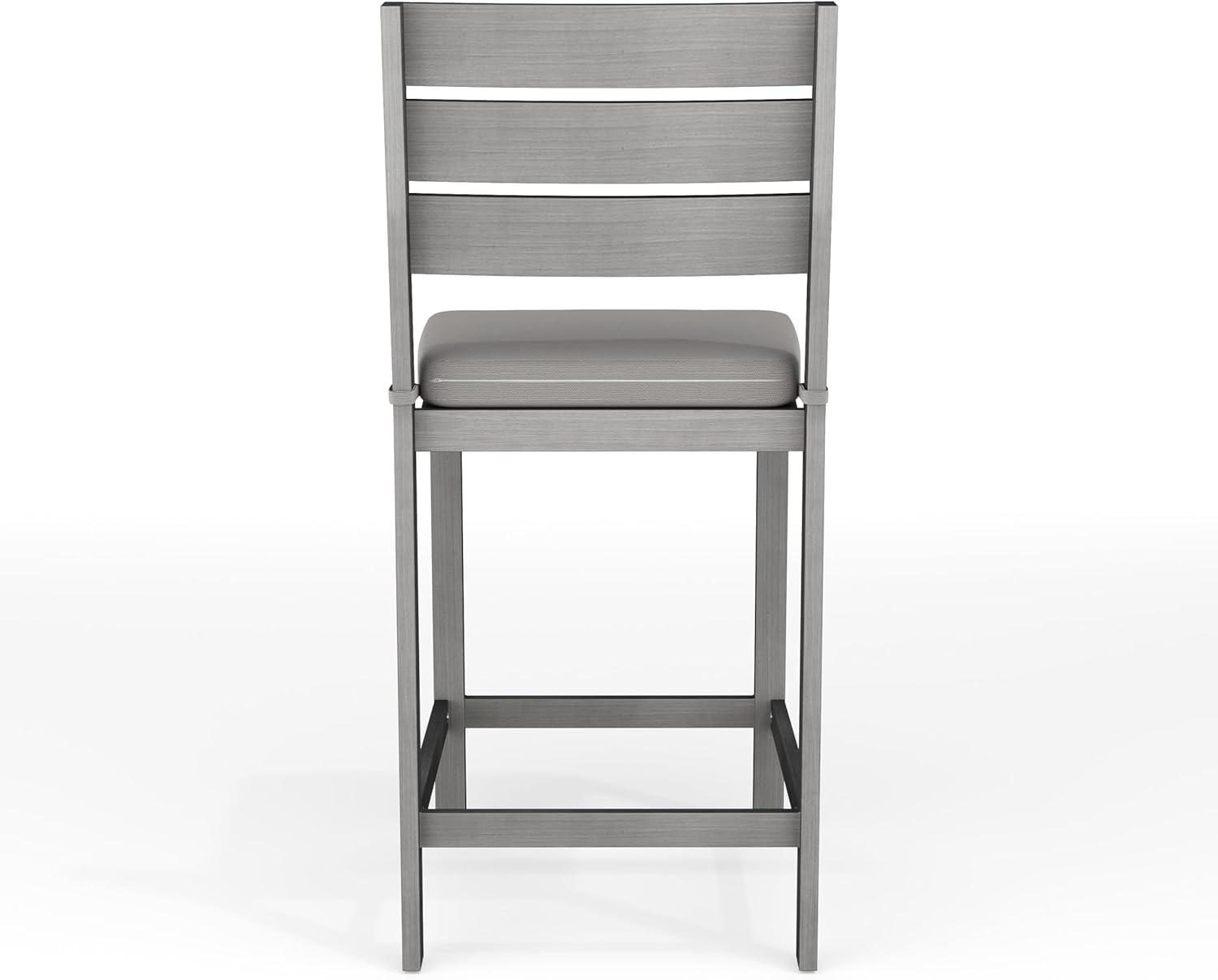 imageMartha Stewart Bedford 5 Piece Bar Height Indoor Outdoor Aluminum Patio Set 355 Square Slat Top Table 4 Stools Gray Brushed Woodgrain Finish Gray Seat CushionsGrey